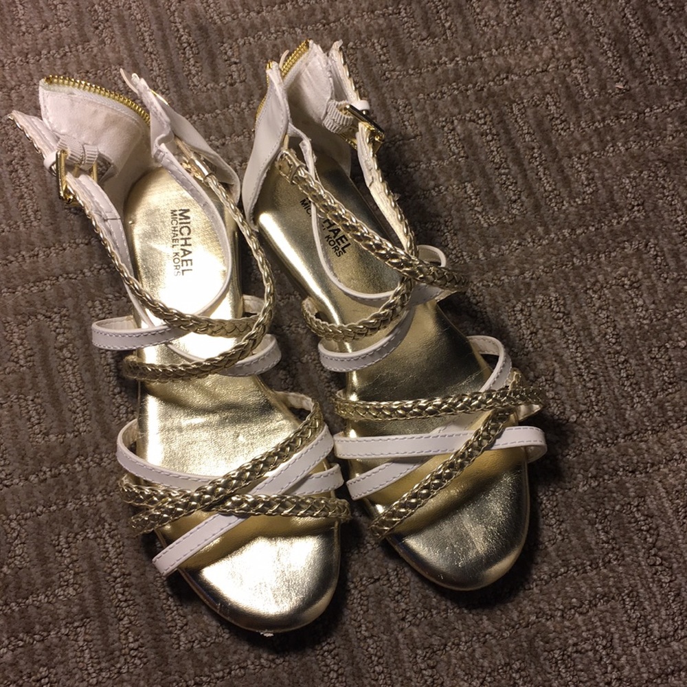 Gold and white sandals